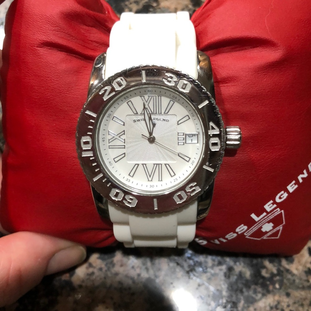 Swiss Legend white watch.